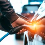 Cemaphoro Case Studies page: Person charging their electric vehicle.
